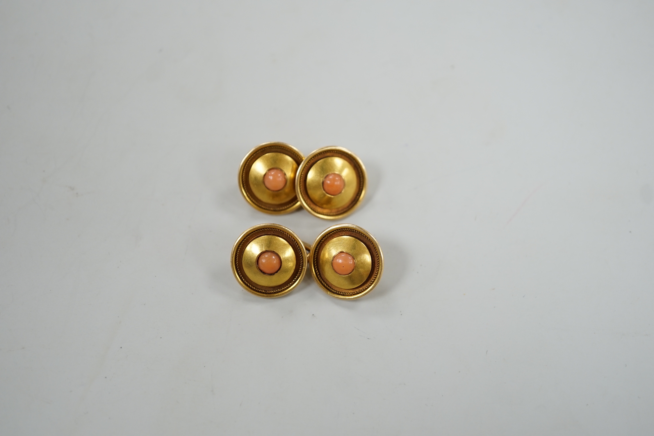 A pair of yellow metal and coral bead set cufflinks, 13mm